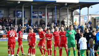 Swindon players line up before Barrow