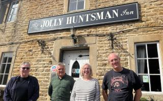 Committee members Gerry Gamble, Neil White, Linda Durno, and Alex Hall (left to right) at The Jolly Huntsman pub in Wiltshire.