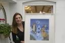 Joanna May with her Moonraker painting at her gallery in Devizes. Photo: Trevor Porter 69445-2