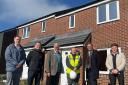 Keys to Backbridge Farm's first seven homes have been handed over