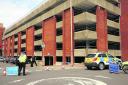 Police outside the multi-storey car park after Mr Wyllie’s fall in June this year