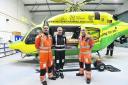 The new Bell 429 air  ambulance, with Captain George Lawrence, centre,  and paramedics Richard  Miller and Matt Baskerville. Photo: Diane Vose (dv1908)