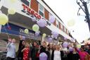 Balloons fly to mark the 61 staff members who lost their jobs at Tesco in Devizes today. By Vicky Scipio