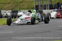 Bratton’s Ben Norton leads Roger Orgee in the Formula Ford 1600 race