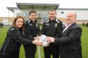 Melksham Town Football Club representatives Karen Forester, Andy Butcher, club chairman Dave Wiltshire and first-team manager Darren Perrin celebrate the opening of the club’s new ground at Oakfields, which will also play home to Melksham RFC