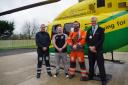Jason Cook (second left) with Wiltshire Air Ambulance crew members who attended him (l-r) , pilot George Lawrence, paramedic Ross Culligan and Head of Operations Kevin Reed