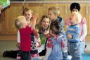 Children experience the wonder of soapy water at Sutton Benger mother and toddler group