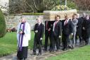 Pallbearers carry the coffin of Dave Turner into Wroughton Parish Church yesterday