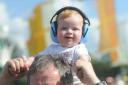Elliot and dad Paul Tuckett, of Corsham, enjoy the sounds in safety at WOMAD