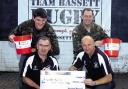 Front Chris Elias, Martin Lloyd; back, Sgt Ian Mason, and WO2 Jack Barnett with the cash collected