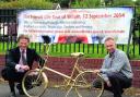 Devizes Area Board chairman Simon Jacobs and community area manager Richard Rogers with one of the town’s gold bikes placed on the route through the town where the sprinters will be tested. Picture by Paul Morris