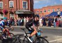 Fans cheer Sir Bradley Wiggins outside the Wadworth Brewery Visitor Centre