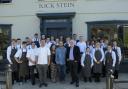 Rick Stein and the restaurant team standing outside the restaurant at Lloran House