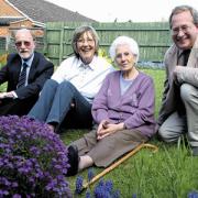 Age Concern volunteer Jackie Cuttle will continue to offer Phylis Ponting free help in her garden in Devizes. Also pictured are Steve Coe and Alan Truscott from the charity
