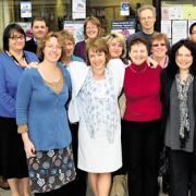 Liddy Davidson, centre, with colleagues Alan Truscott, Jayne Funnell, Colin Sutton, Beckie Stooke, Penny Church, Belinda Fowler, Anjie Houdek, Alison Davies, Bill Turner, Eileen Beech, Anne Tope and Elliot Potter