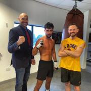 Chippenham’s super-middleweight contender Johnny Ward (centre) alongside WBC world heavyweight champion Tyson Fury (left) and trainer, Roger Lee (right)