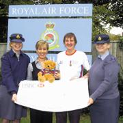 Margot Muller presents the cheque to Belinda Mollan, Help for Heroes co-ordinator Bernice Brady and Careena Blyth