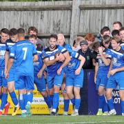 Chippenham celebrate their late winner against Dulwich Hamlet in National League South on Saturday Photo: Richard Chappell
