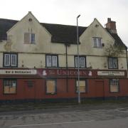The derelict Unicorn pub after a fire in Melksham
