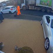 Doorbell footage captured the bin men launching boxes carelessly through the air.