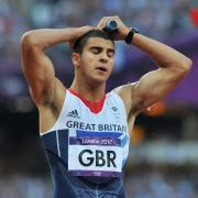 Danny Talbot's Team GB team-mate Adam Gemili shows his disappointment after tonight's 4x100m relay heat
