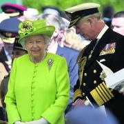 The Queen and the Prince of Wales attend the service of remembrance at the Commonwealth War Graves Commission Cemetery, Bayeux, to mark 70th anniversary of the D-Day landings