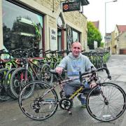Ed Cobb of TT cycles  with one of the bikes on the Towns Bike Trial named after famous cyclists