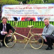 Devizes Area Board chairman Simon Jacobs and community area manager Richard Rogers with one of the town’s gold bikes placed on the route through the town where the sprinters will be tested. Picture by Paul Morris