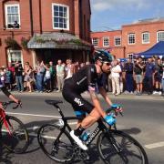 Fans cheer Sir Bradley Wiggins outside the Wadworth Brewery Visitor Centre
