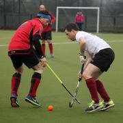 Corsham’s Tom Marks (white) in action against City of Bath B on Saturday (VS1068)