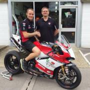 Tommy Bridewell is welcomed by Moto Rapido Ducati team owner Steve Moore. Picture: @OfficialBSB
