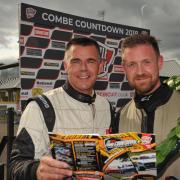 Melksham drivers Adrian Slade and Simon Thornton-Norris totting up their championship points after their successful drives in the Saloon Car Championship at Castle Combe's Bank Holiday meeting. Photo Trevor Porter 59830 7..