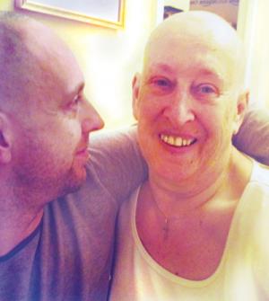 Wendy Larkin, who has shaved her hair off ahead of chemotherapy treatment, with son Robyn