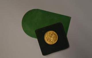 The gold sovereign that was donated to Julia's House