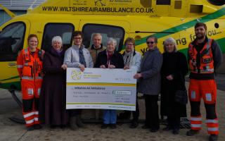 Members of Con Brio with Wiltshire Air Ambulance paramedics Sophie Holt and Ben Abbott