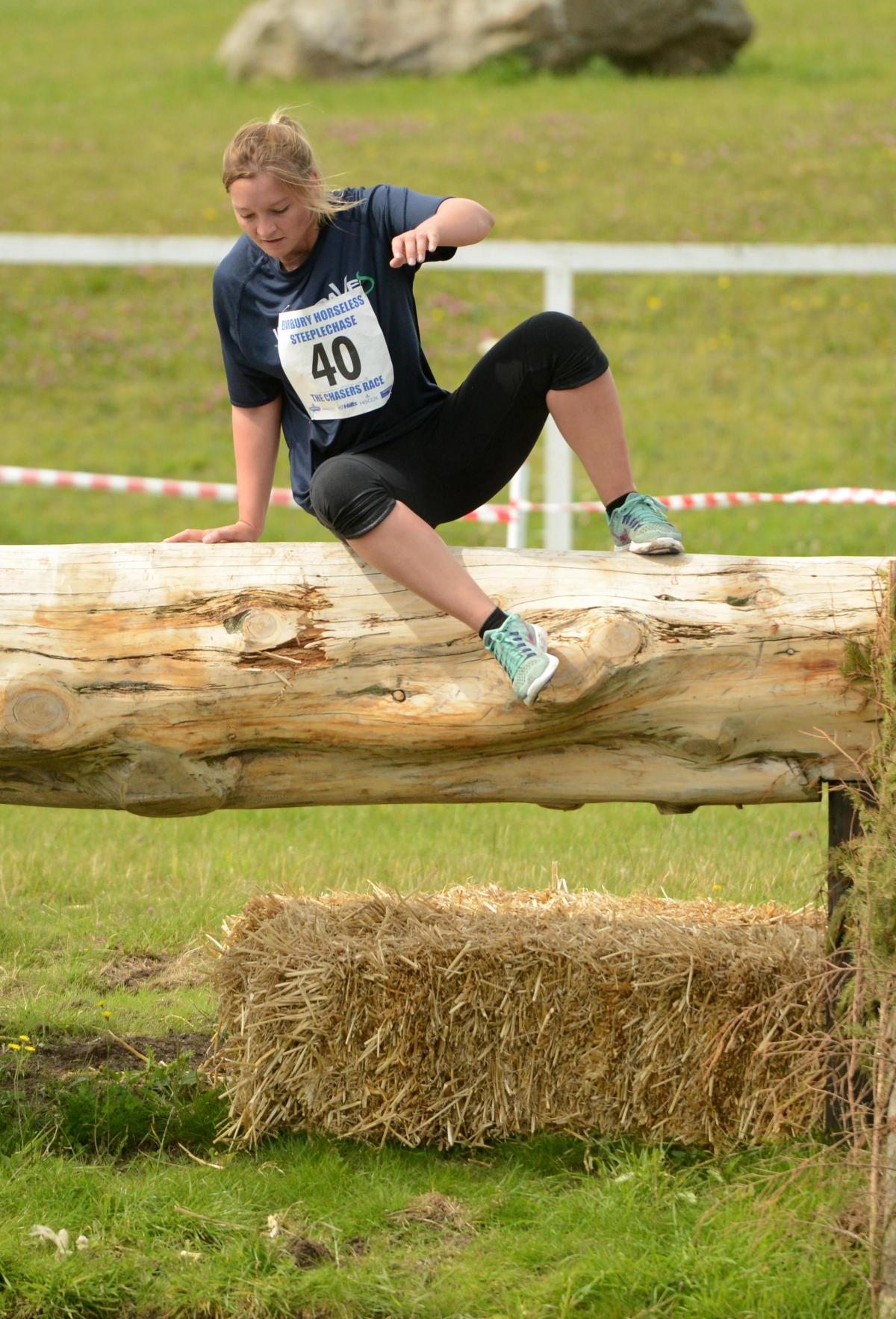 Action from the Horseless Steeplechase at Barbury captured by Clare Green