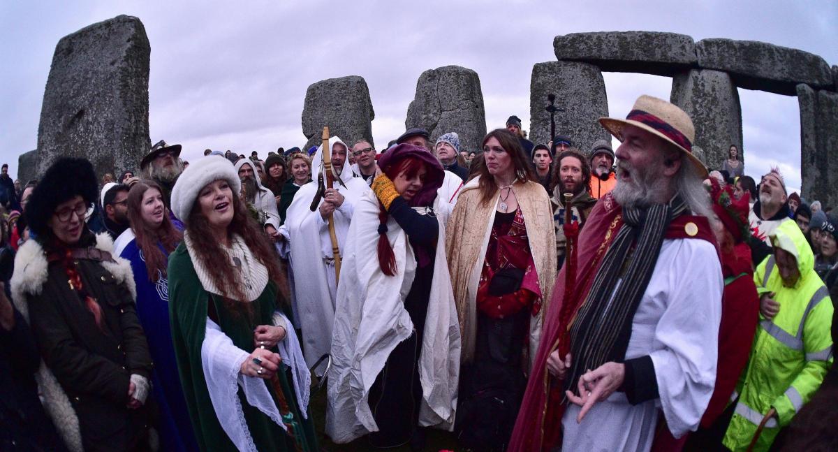 People gather at Stonehenge to celebrate the Winter Solstice - the shortest day of the year. Picture: Ben Birchall/PA Wire