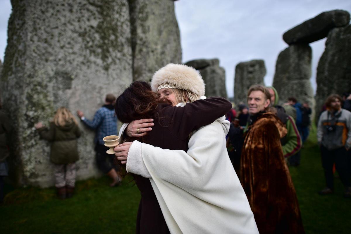 People gather at Stonehenge to celebrate the Winter Solstice - the shortest day of the year. Picture: Ben Birchall/PA Wire