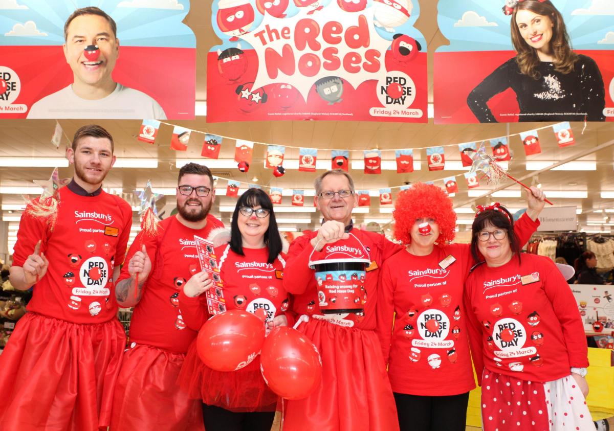 Members of staff at Sainsbury's in Chippenham dress up for Red Nose Day. Picture by Vicky Scipio