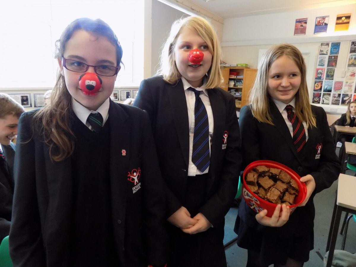 Year 7 pupils at Devizes School sell cakes on Red Nose Day in aid of Comic Relief