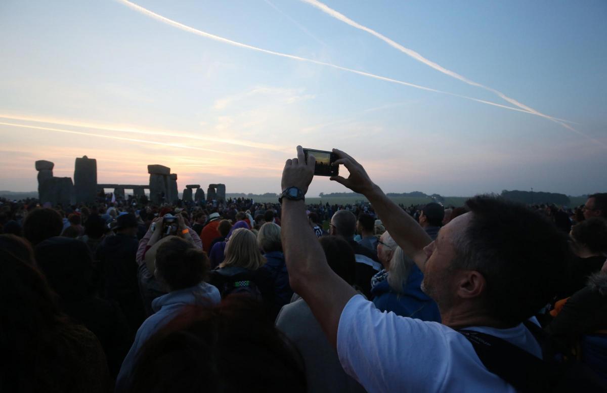 Celebrating the summer solstice at Avebury. Picture: Thomas Kelsey