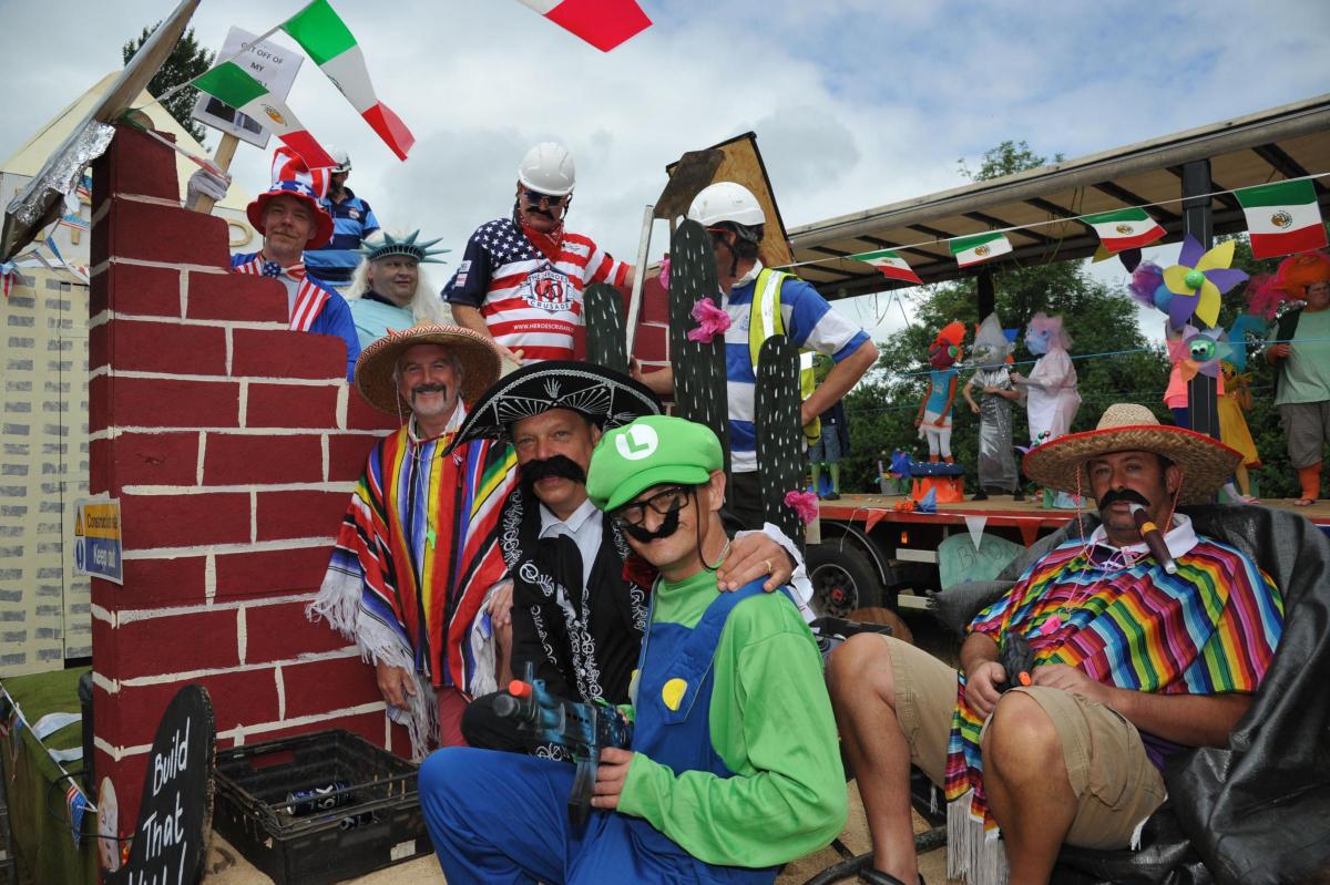 Bromham Wednesday Club has fun with the Trump wall at Bromham Carnival. Picture by Trevor Porter