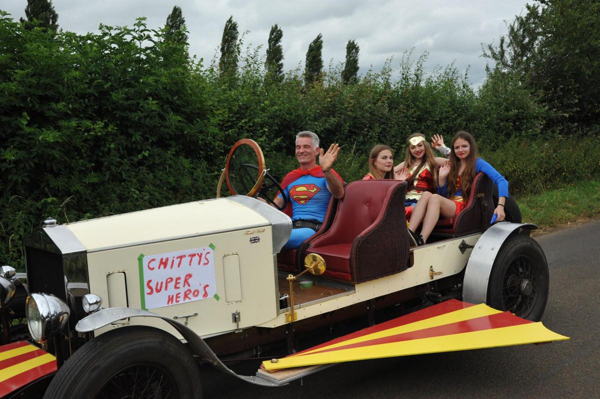 Chitty's super heroes Robert Sjore with Charlotte, Alice and Camilla.
Picture by Trevor Porter