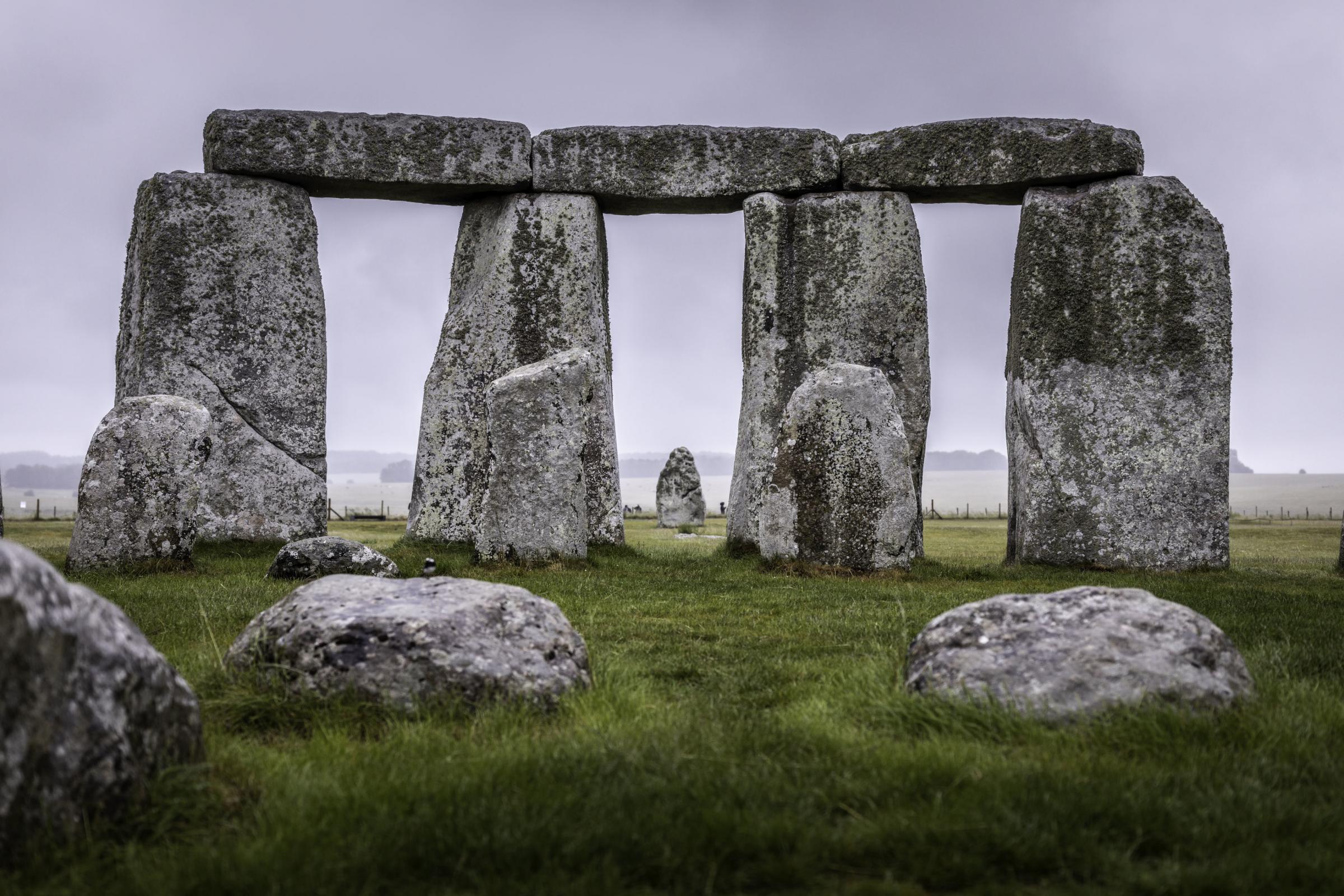 Handout photo issued by English Heritage of Stonehenge in Wiltshire, during a soggy start after the shortest night of the year, as more than 3.6 million people around the world tuned in to a livestream from Stonehenge on Saturday night and Sunday morning