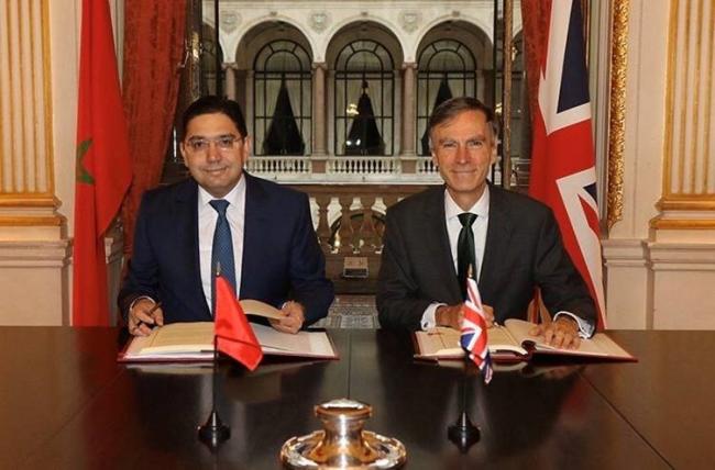 Dr Andrew Murrison signs a post-Brexit trade agreement with Moroccan Foreign Minister His Excellency Nasser Bourita