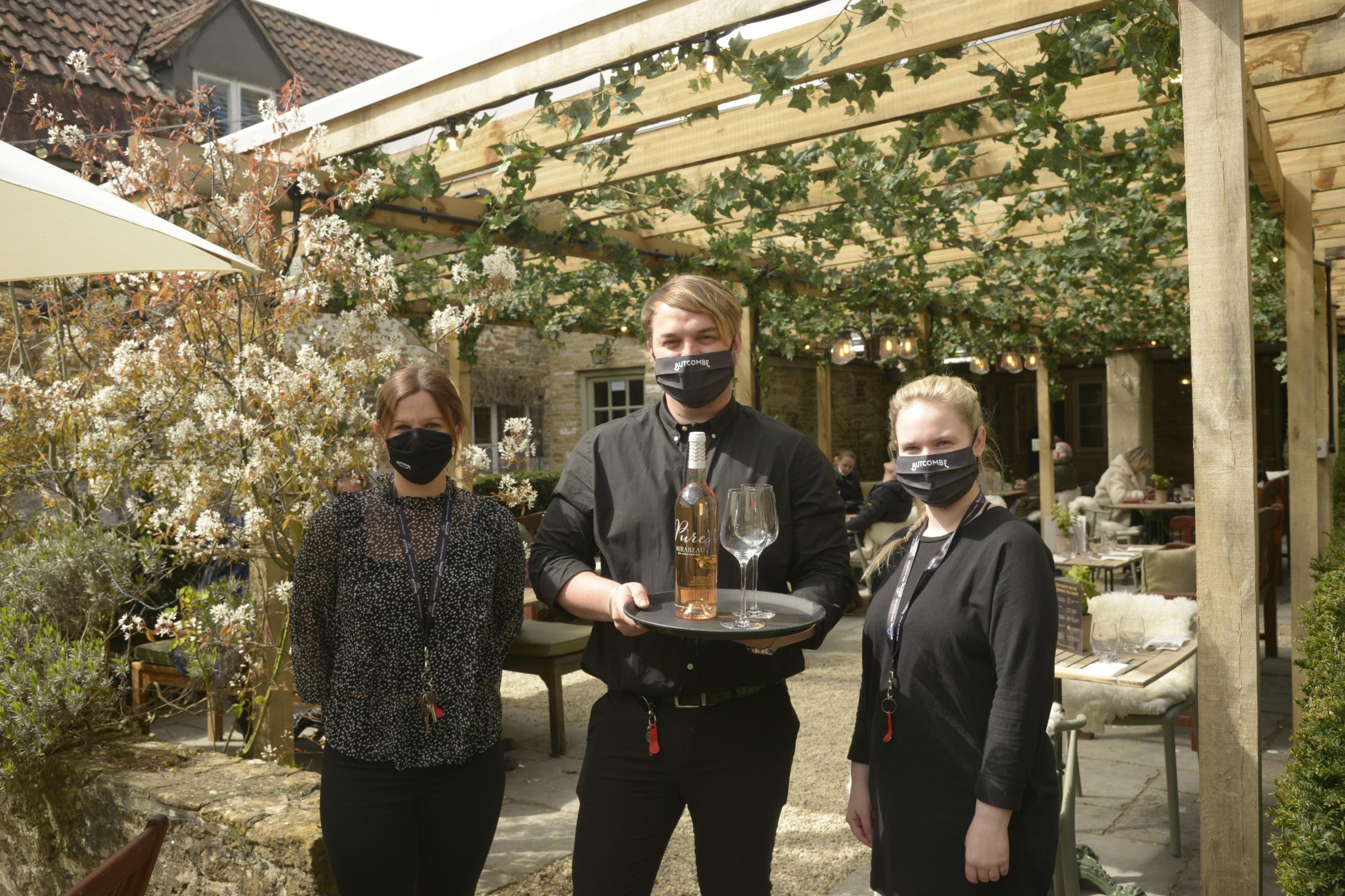 Methuen Arms Corsham Sam Priest with staff Steph Burgess and Ashleigh Hayes at the Courtyard at the Methuen Arms Corsham Photo Trevor Porter 67346 1