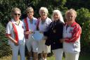 The North Wilts rink who won the ladies senior fours championship (from left) Fizz Mace, Ann Roberts-Phare, Janet Hardie and June Coyle, pictured with county ladies president Ruth Gerrish