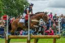 Alicia Hawker (GBR) riding CHARLES RR during cross country phase of the Land Rover Burghley Horse Trials in the grounds of Burghley House near Stamford in Lincolnshire in the UK between 5 - 8th September 2019