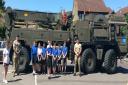 Massive tank helps Olympic torch on journey through Calne