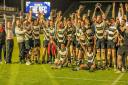 Chippenham rugby club players celebrate after they won the Bath Combination Cup at The Rec Photo: Roger Rhymes